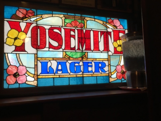 Stained glass beer ad inside Vesuvio's, San Francisco.